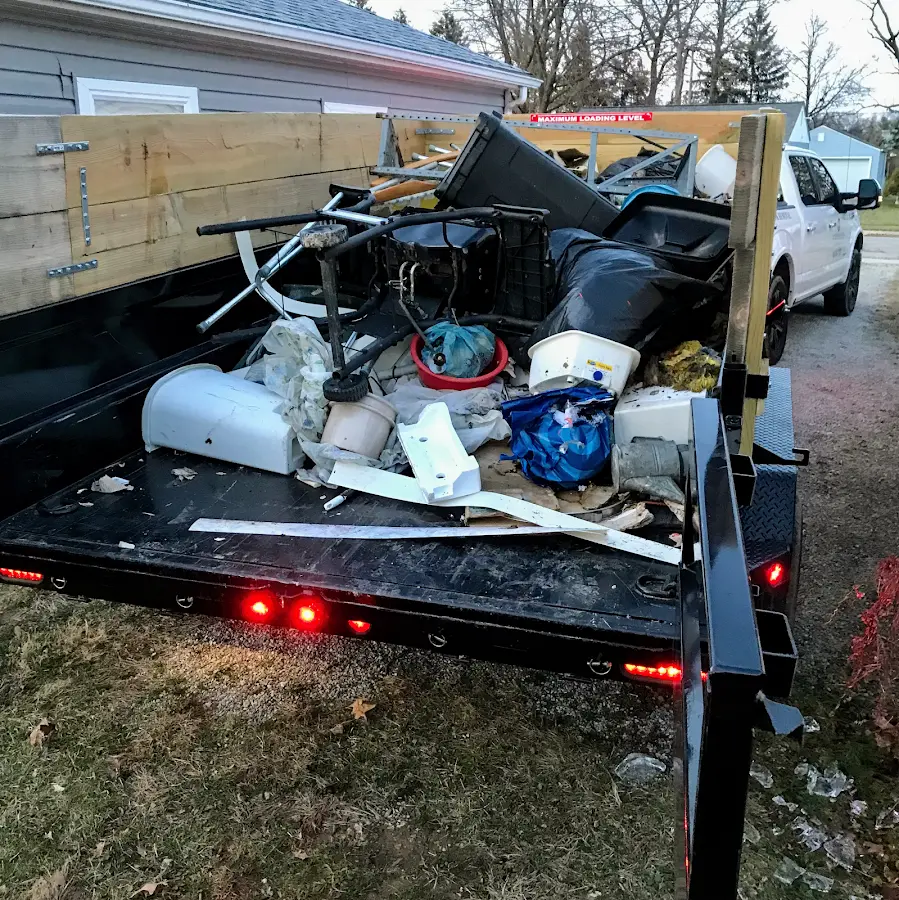 Roll-off dumpster delivered to a residential driveway in Winterset